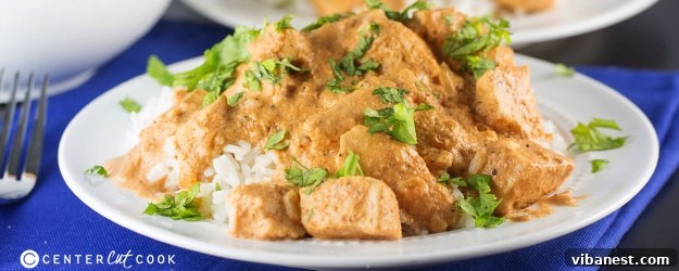 Delicious Slow Cooker Chicken Tikka Masala served with rice and naan