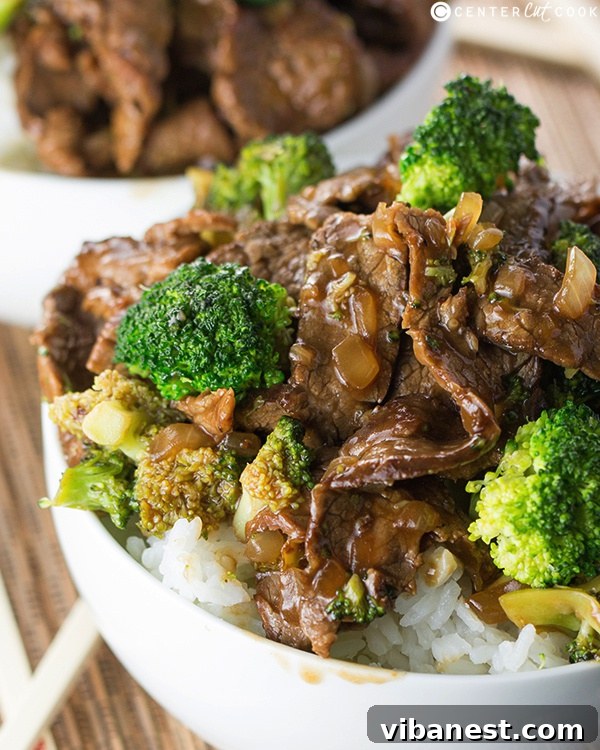 Tender Beef and Crisp Broccoli in a Rich Sauce Close-up of perfectly cooked Broccoli Beef stir-fry in a wok