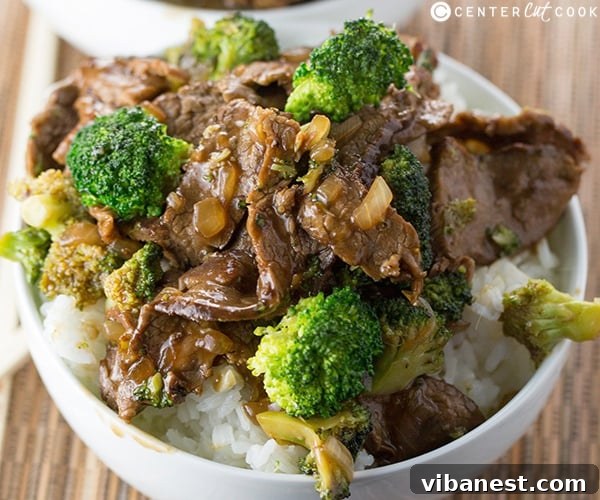 Prepped Ingredients for the Perfect Broccoli Beef Stir-Fry Fresh broccoli florets and thinly sliced marinated beef ready for stir-frying