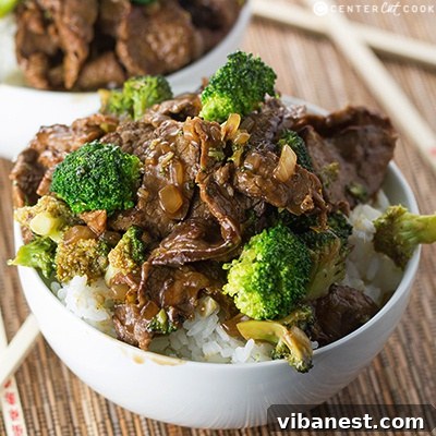 A serving of hot homemade Broccoli Beef over rice
