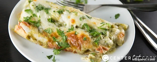 Green Chicken Chile Enchiladas Plated Plated Green Chicken Chile Enchiladas with garnishes