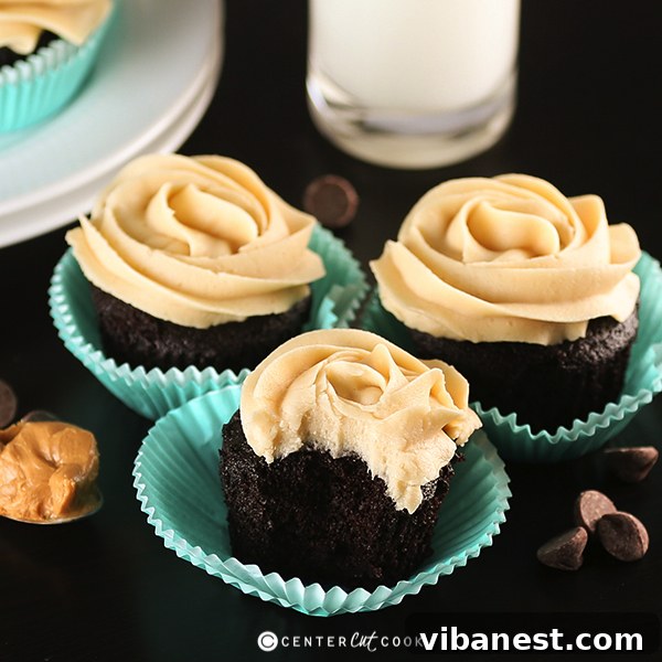chocolate peanut butter cupcakes fb A vibrant display of chocolate peanut butter cupcakes, ready to be served at an event.