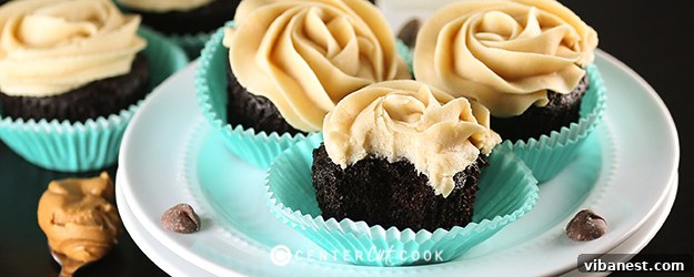 chocolate-peanut-butter-cupcakes.jpg A beautifully arranged platter of chocolate peanut butter cupcakes, garnished and ready for serving.
