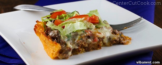 Deliciously golden-brown Taco Pie with creamy Queso Blanco topping