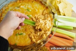 Ultimate Tangy Chicken Dip 4 buffalo chicken dip served with celery, carrots, crackers and tortilla chips