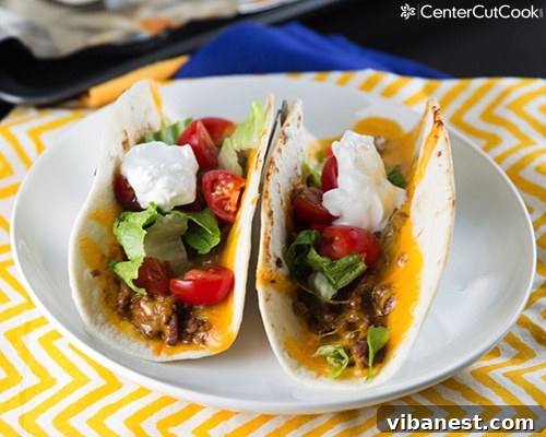 oven tacos 5.jpg Close-up of oven tacos baking with melting cheese