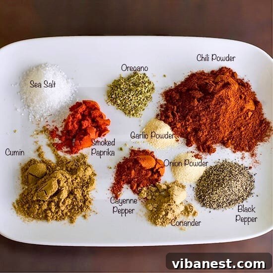 Homemade Taco Spice Blend 4 Individual spices laid out on a table for making homemade taco seasoning