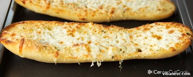 Crispy Cheesy Garlic Bread Close-up of golden cheesy garlic bread