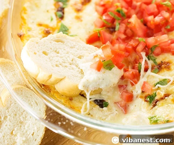 Fonduta ingredients mixed and ready to bake. Close-up of the mixed cheese and sour cream mixture before baking for fonduta.
