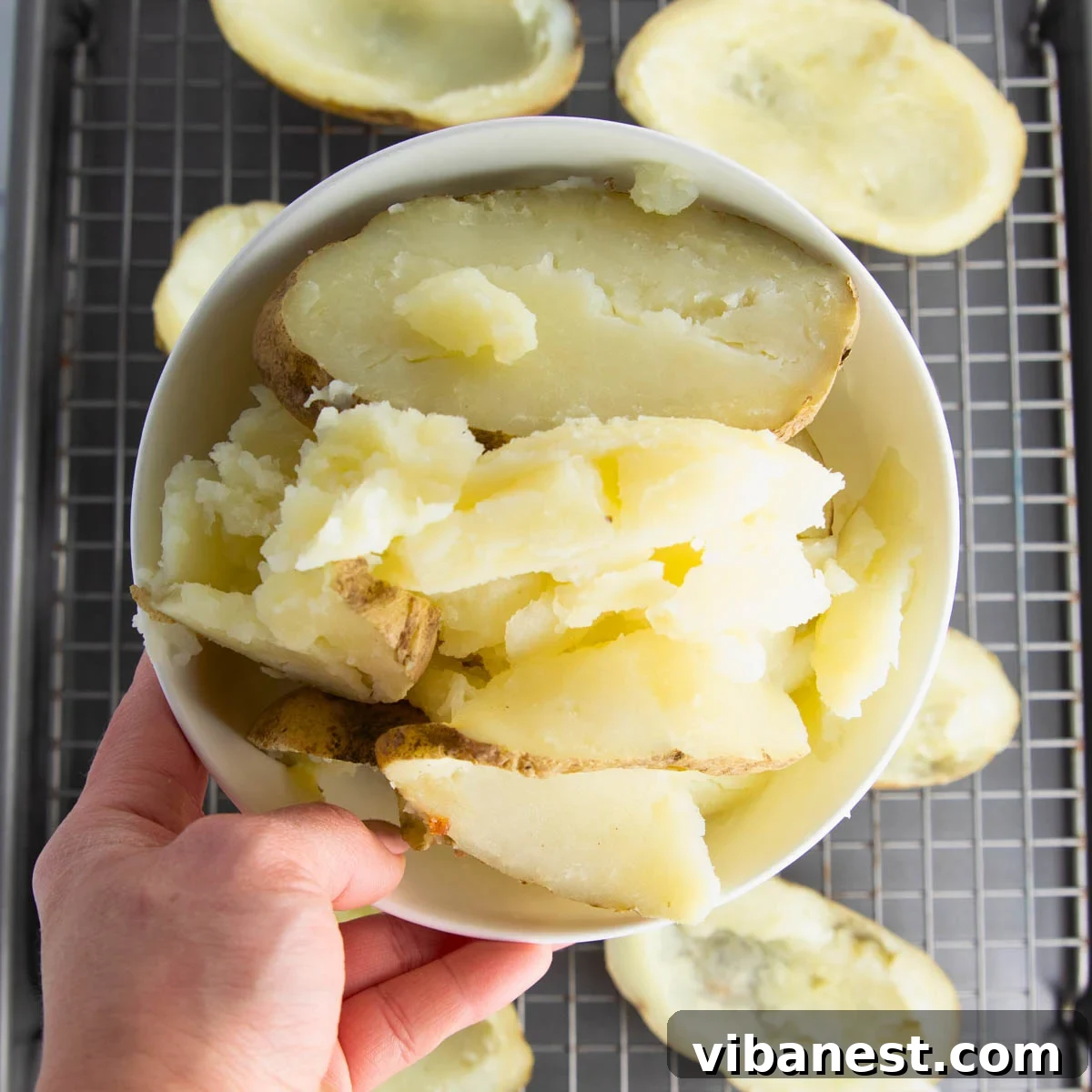 Fully Loaded Potato Boats 6 The scooped-out potato pulp, ready to be saved for other recipes, and the thin potato shells prepared for broiling.