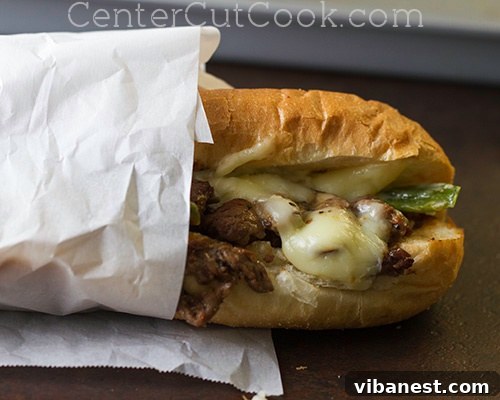 philly cheesesteak sandwiches 7.jpg Container of leftover Philly Cheesesteak mixture in the refrigerator