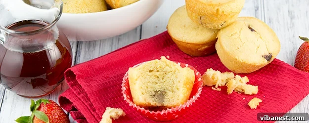 variety-pancake-muffins Various baked pancake muffins arranged appealingly on a plate, showcasing different mix-ins.