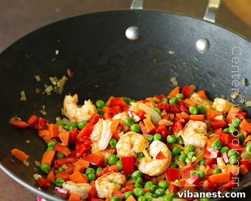 A delicious serving of Chinese fried rice, garnished with fresh green onions. Chinese fried rice 4