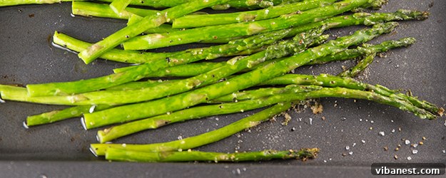 A beautifully presented serving of oven roasted asparagus, ready to eat.