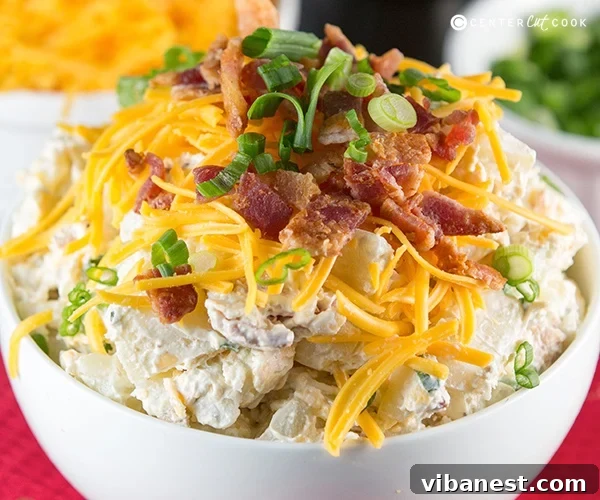 loaded baked potato salad 5.jpg Close-up of creamy Loaded Baked Potato Salad with golden bacon bits and shredded cheddar