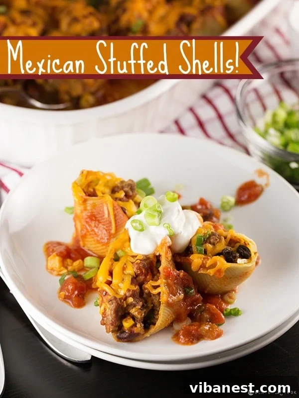 Garnished Mexican Stuffed Shells serving A serving of Mexican Stuffed Shells on a plate, garnished and ready to eat.