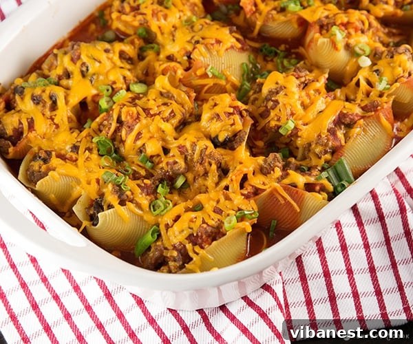 Mexican Stuffed Shells ready for dinner Table setting with Mexican Stuffed Shells ready to be eaten.