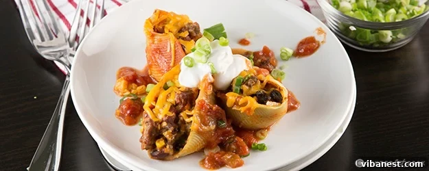 Full dish of Mexican Stuffed Shells Overhead shot of the entire baking dish filled with Mexican Stuffed Shells.