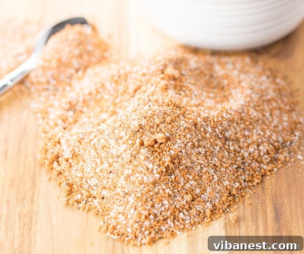 Dry Rub for Ribs and Chicken 4.jpg Dry Rub for Ribs and Chicken 4 - A close-up of the mixed dry rub on a dark surface, highlighting the various spices.