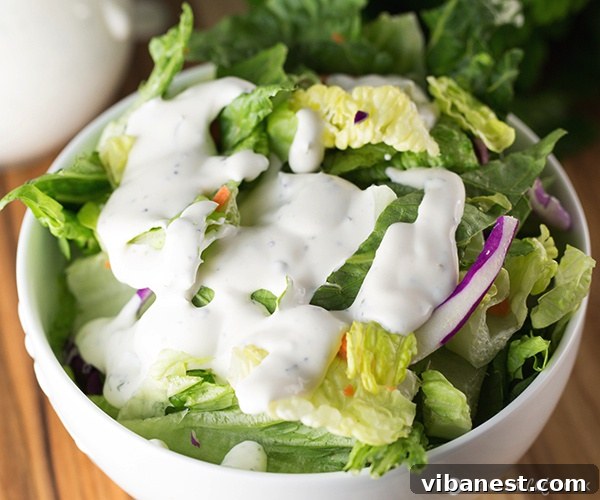 buttermilk ranch dressing 5.jpg Creamy buttermilk ranch dressing being prepared, showcasing its smooth and inviting texture