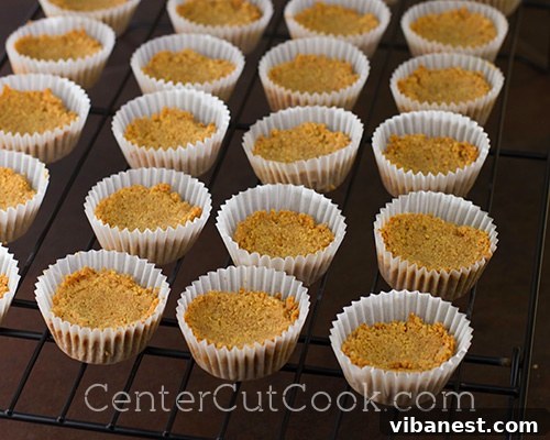 Freshly baked graham cracker peanut butter crusts ready for the next layer. Peanut butter smores bites 3
