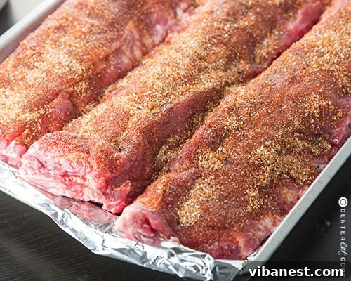 Essential Dry Rub for Flavorful Ribs Close-up of a bowl filled with a homemade dry rub seasoning, ready for application on meats like ribs or chicken.