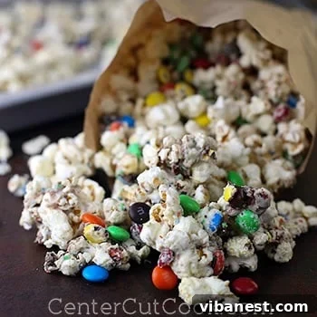 A bowl of freshly made white chocolate M&M's popcorn, ready to be enjoyed