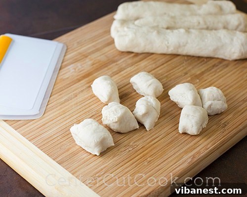 Cut Pretzel Bites.jpg Pretzel dough expertly cut into individual bites, poised for the essential baking soda bath.
