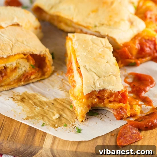 Pepperoni Pizza Bread Slices Closeup of Pepperoni Pizza Bread Roll-Up slices on a plate