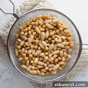 Hearty Italian Bean Salad with Herbs and Vinaigrette 6 drained and rinsed chickpeas and cannellini beans for dense bean salad.