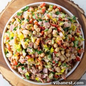Hearty Italian Bean Salad with Herbs and Vinaigrette 10 Italian bean salad tossed with salami, parmesan, vegetables, banana peppers and dressing.